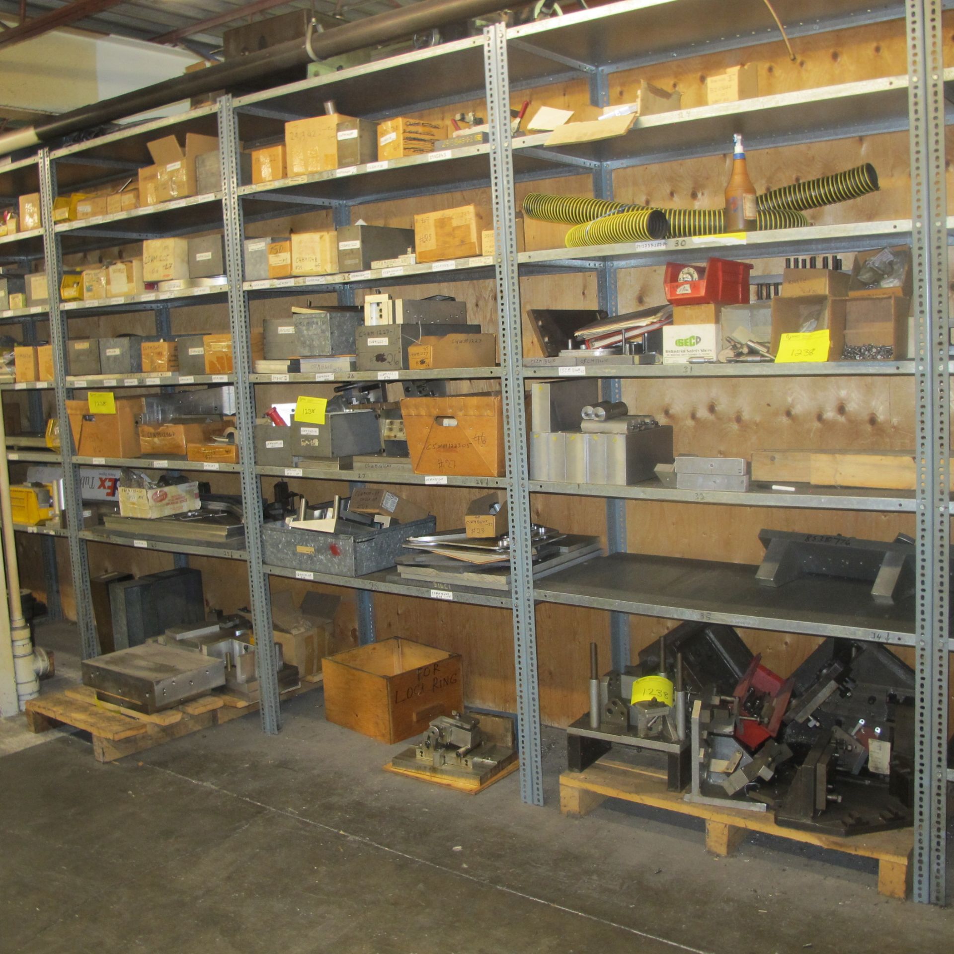 METAL PARTS AND FIXTURES ON (7) SECTION, 7-LEVEL RACK INCLUDING (3) PALLETS IN FRONT OF RACKING (