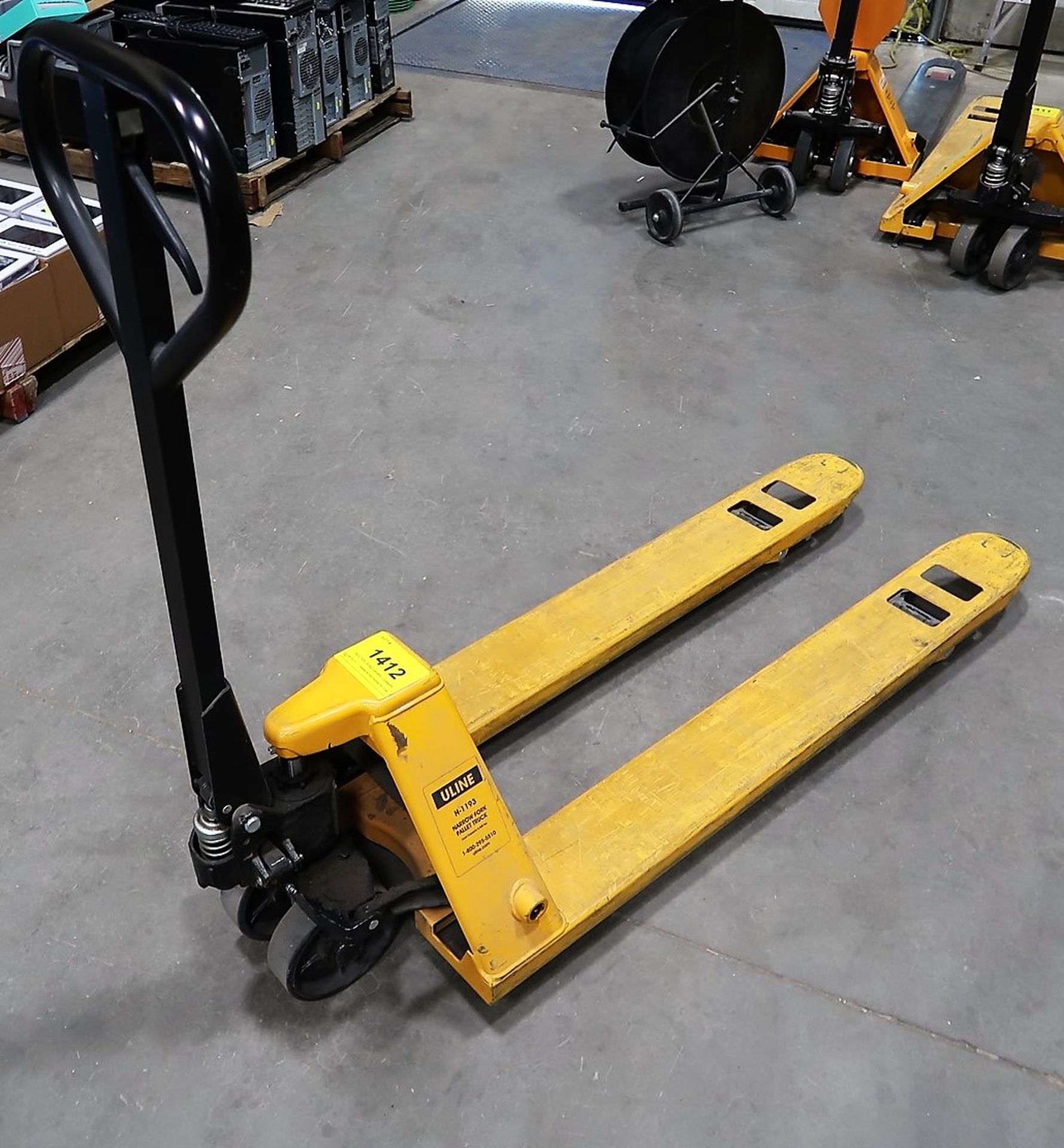 ULINE H-1193 NARROW FORK PALLET JACK (SUBJECT TO LATE REMOVAL, PICKUP ON JULY 7TH)