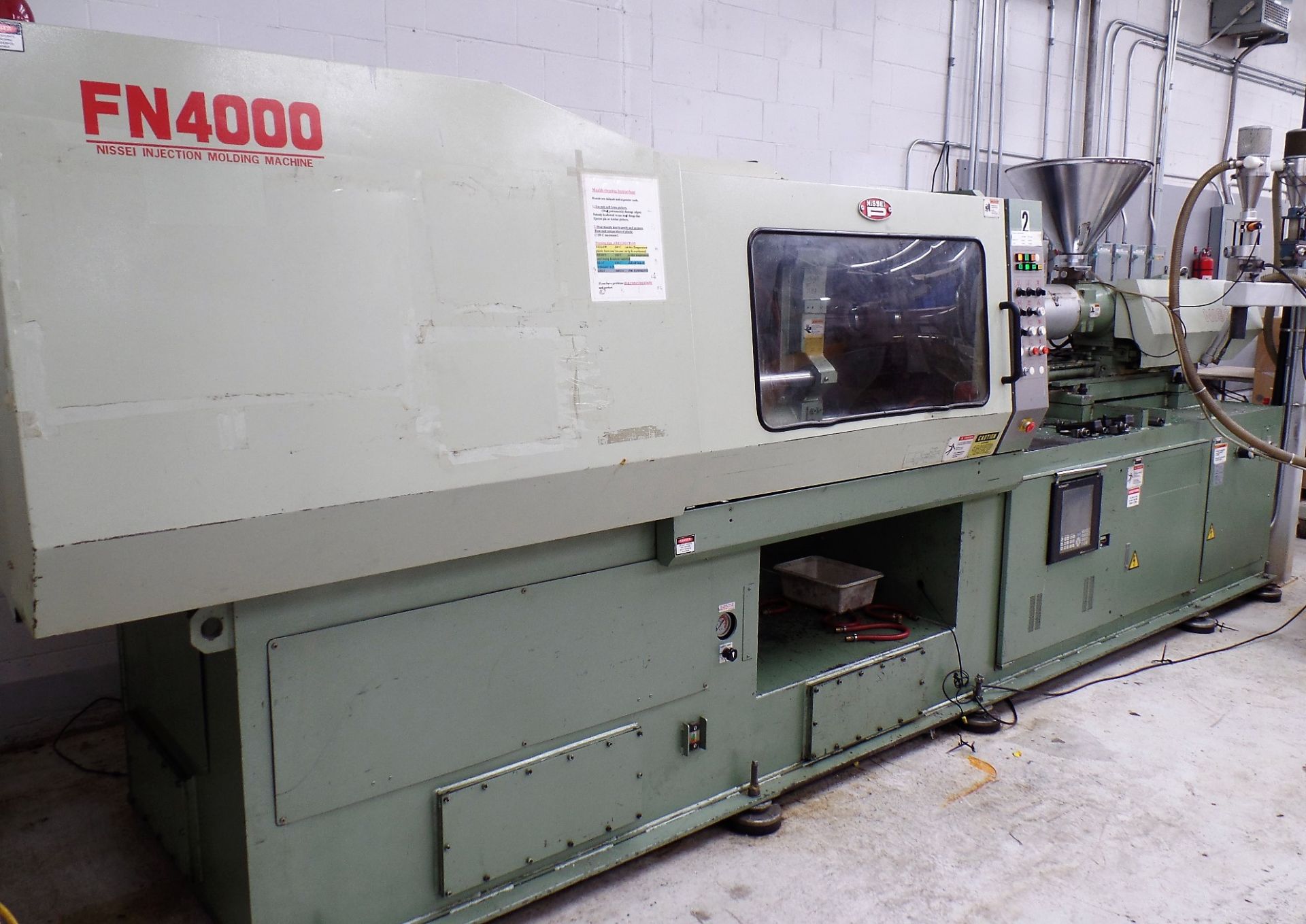 1999 NISSEI FN4000 HORIZONTAL INJECTION MOULDING MACHINE, 200 TON CAP. 160Z. SHOT SIZE 56MM. SCREW