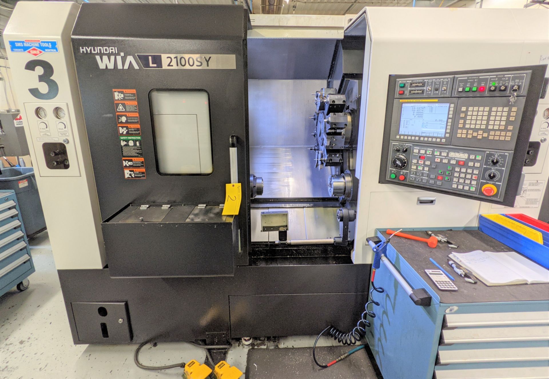 2013 HYUNDAI WIA LS2100SY CNC TURNING CENTER WITH SUB SPINDLE, FANUC 31I-A CNC CONTROL, 24.8” - Image 2 of 25