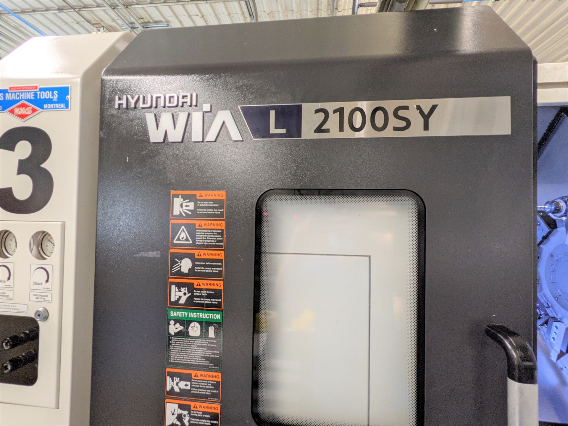 2013 HYUNDAI WIA LS2100SY CNC TURNING CENTER WITH SUB SPINDLE, FANUC 31I-A CNC CONTROL, 24.8” - Image 10 of 25