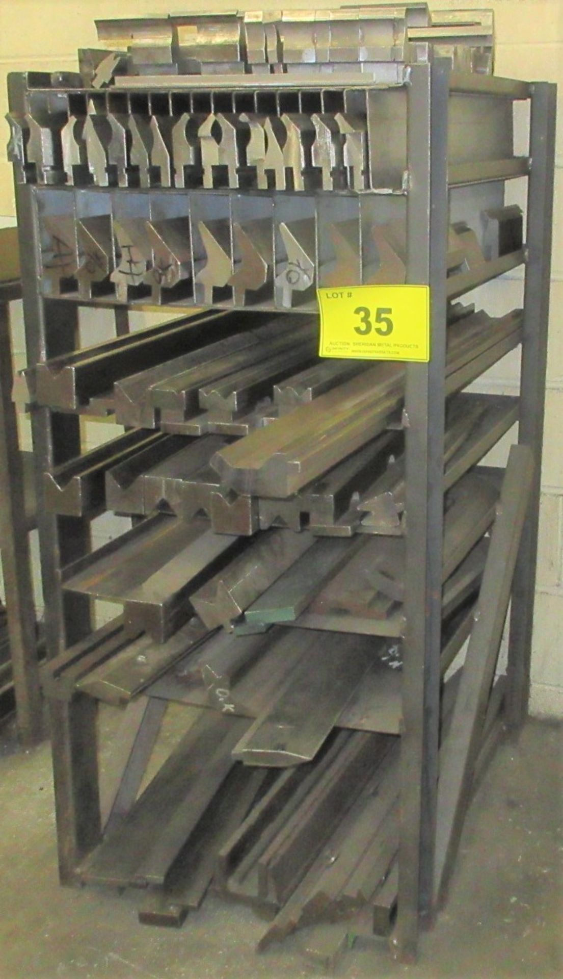 QTY. OF ASST. PRESS BRAKE DIES UP TO 45"L ON 8-LEVEL HEAVY DUTY STORAGE RACK