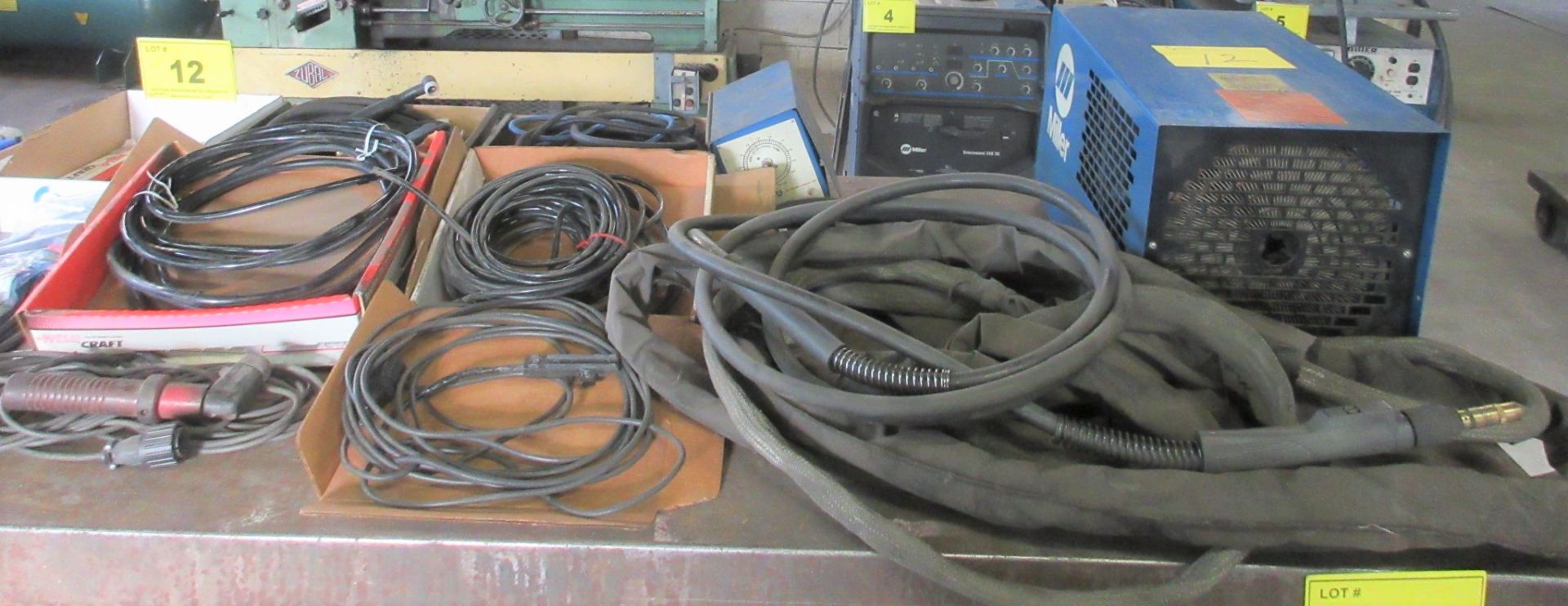 LOT OF WELDING CABLES, TIG / MIG GUNS, ETC.