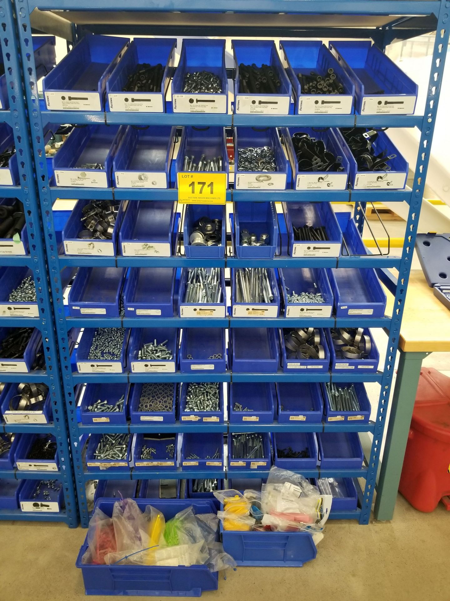 LOT - FASTENAL HARDWARE CONTENTS - COMES WITH RACK AND BINS