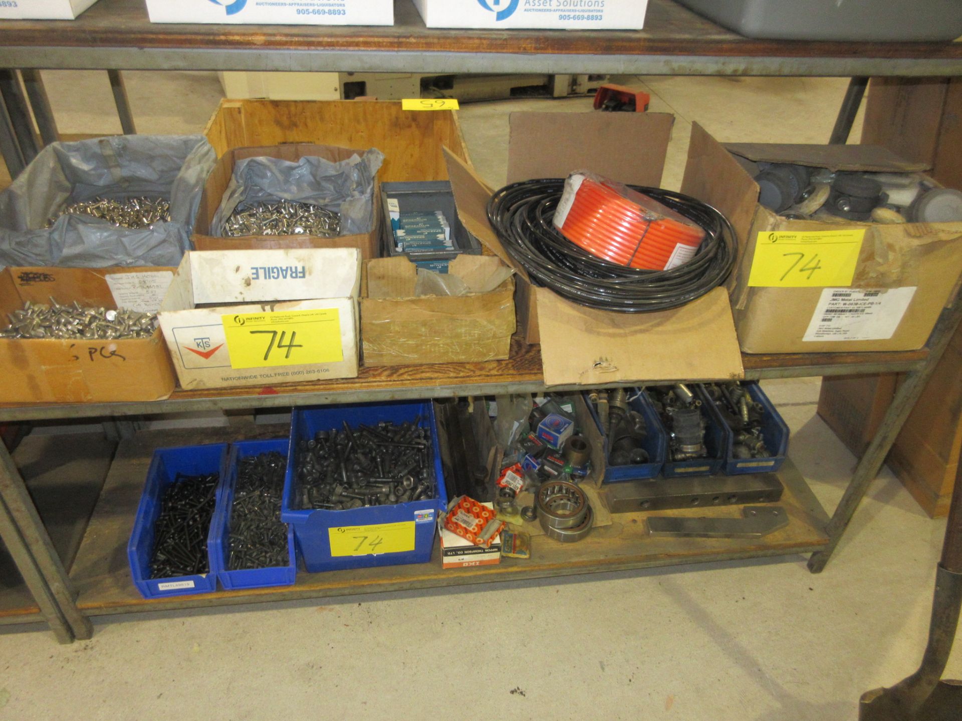 LOT OF (2) SHELVES CONTENTS INCLUDING BEARINGS, MACHINE SCREWS, ETC. AND CRATE W/ MOTOR