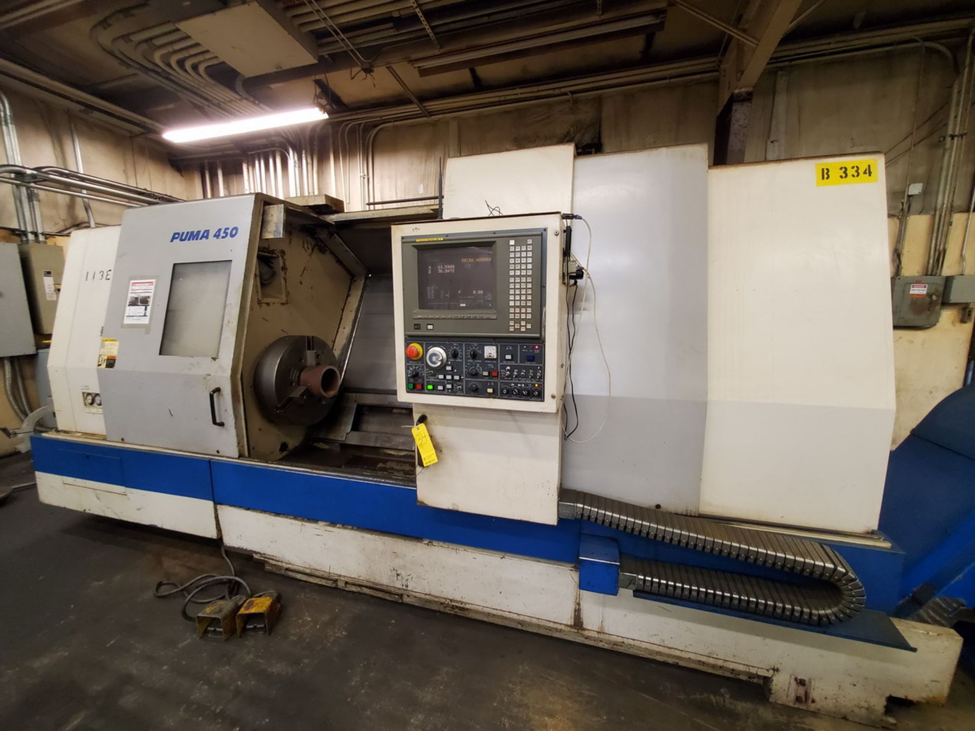 Daewoo Puma 450 NC Lathe 200/220V, 50/60HZ, 3PH, 63.59KVA, 166.89A; W/ 24" 3-Jaw Chuck; W/ Fanuc