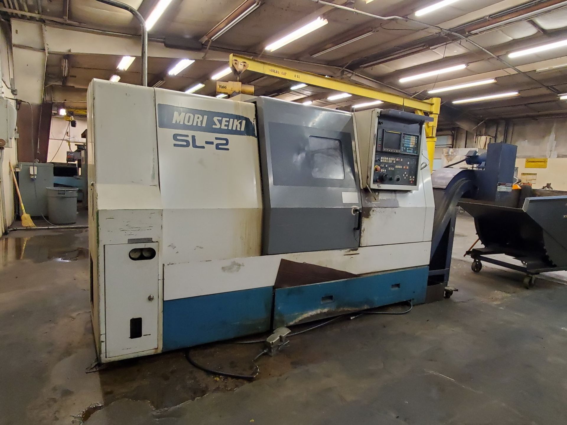 Mori Seiki SL-25 NC Lathe W/ 10" 3-Jaw Chuck, W/ 10-Tool Turret Station, W/ Turbo Conveyor, 10" Feed