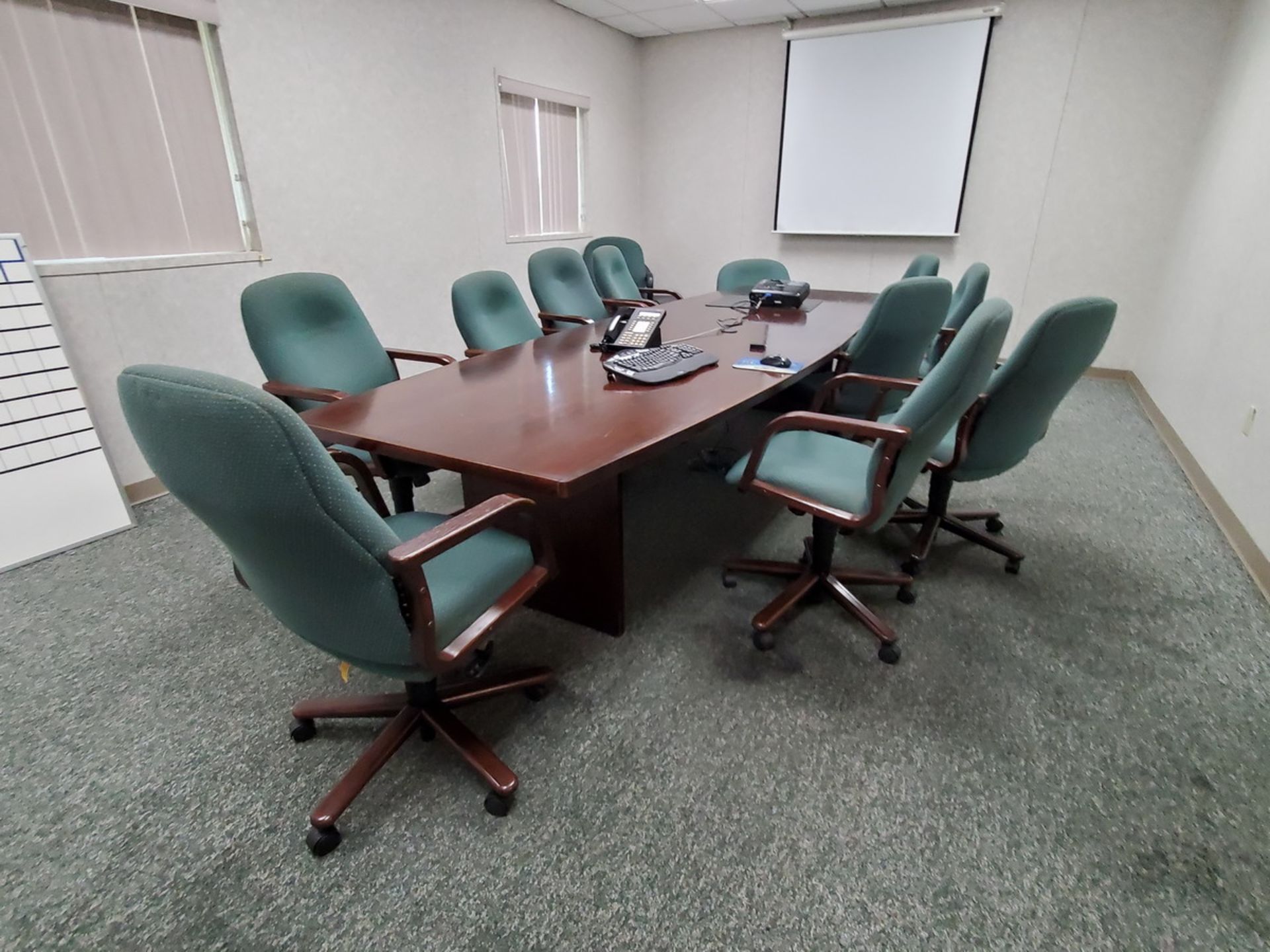 Conference Room (1) Conference Table, 12' x 4' x 2'5"H; (12) 5-Caster Chairs; (1) Chair; (1)