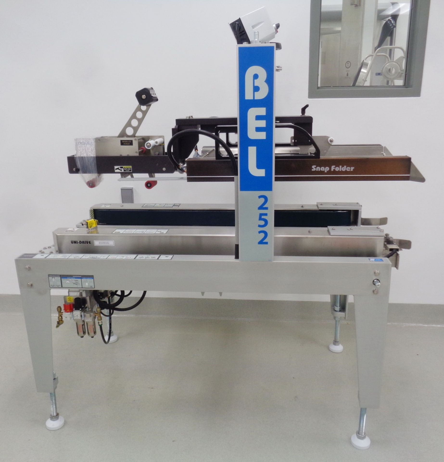 Wexxar BEL Fully Automatic Case Sealer, Model BEL 252, S/N 150973.