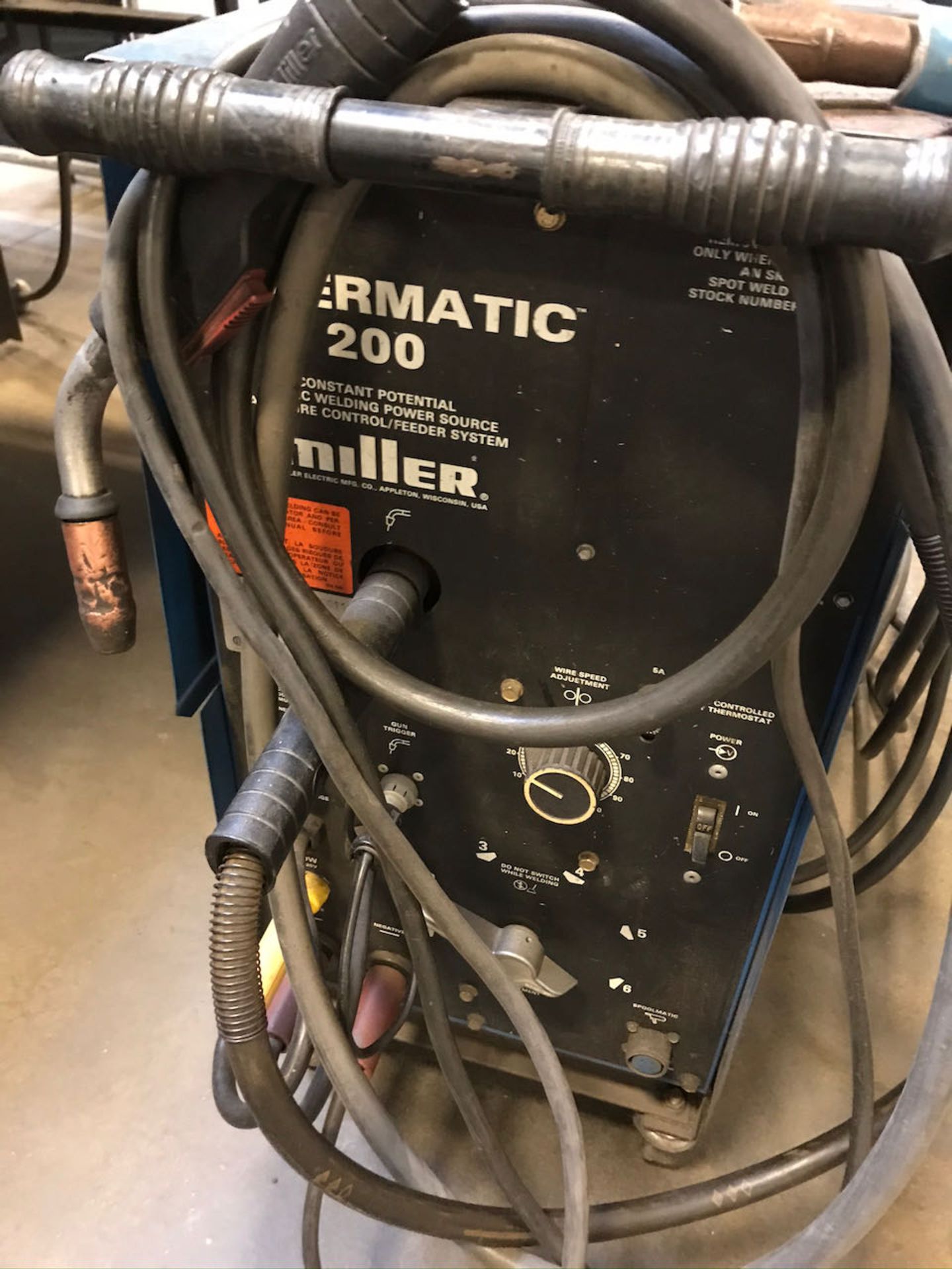 Miller Millermatic 200 welder with work station