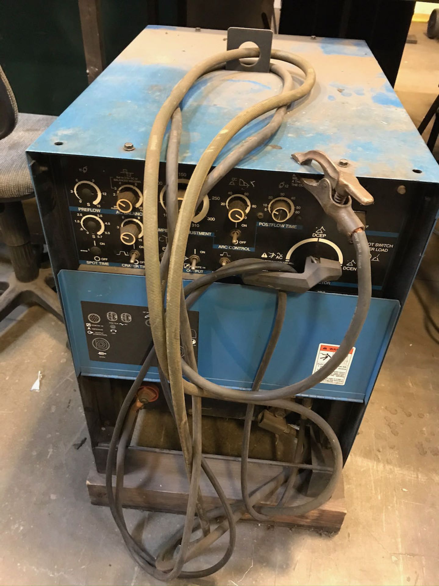 Miller Syncrowave 250 welder with working station