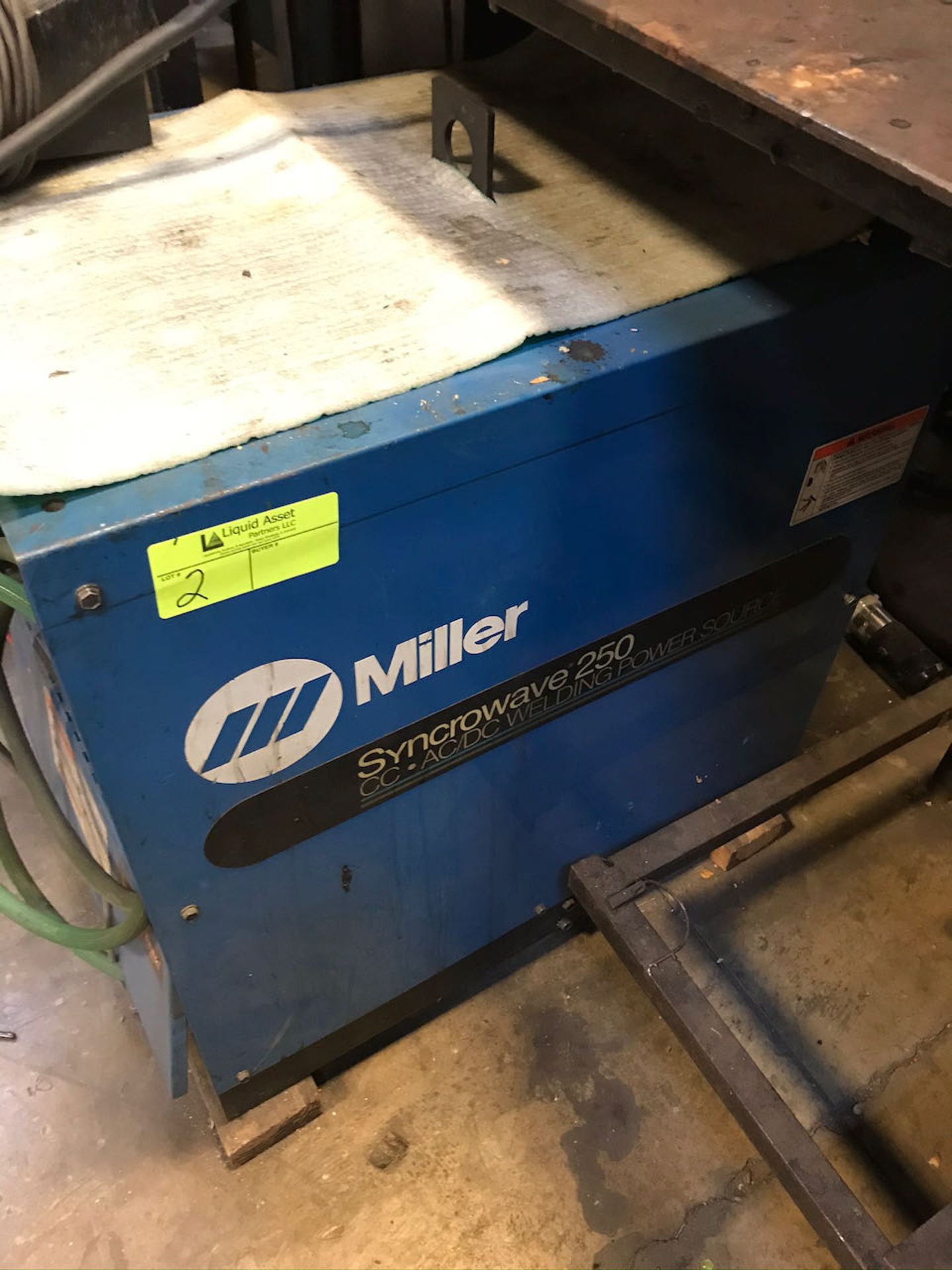 Miller Syncrowave 250 welder with working station