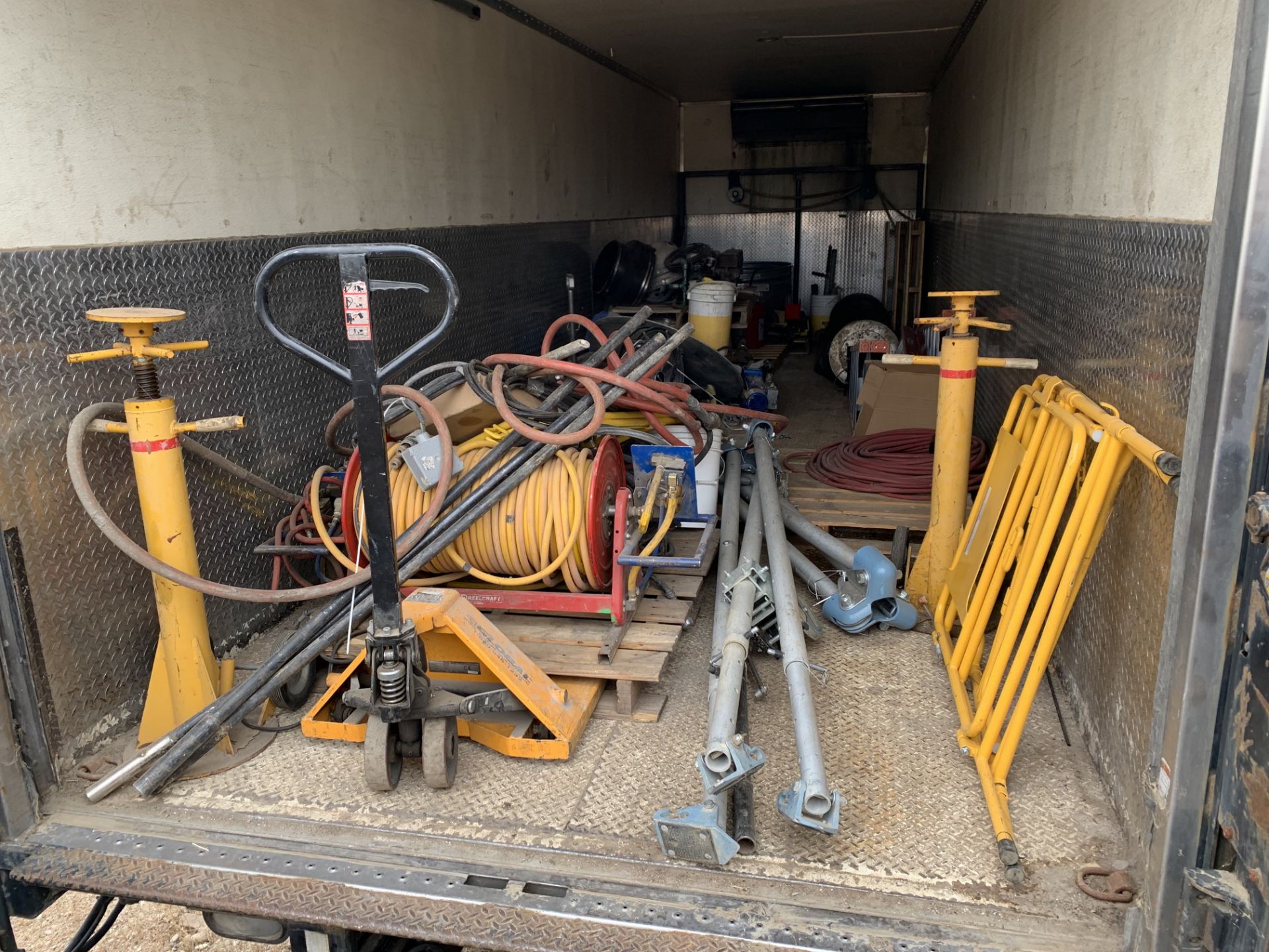 Contents of trailerÉ Pallet jack (5,500 lbs), hoses, reels, risers, fans, motors, bins, tripod winch - Image 2 of 18