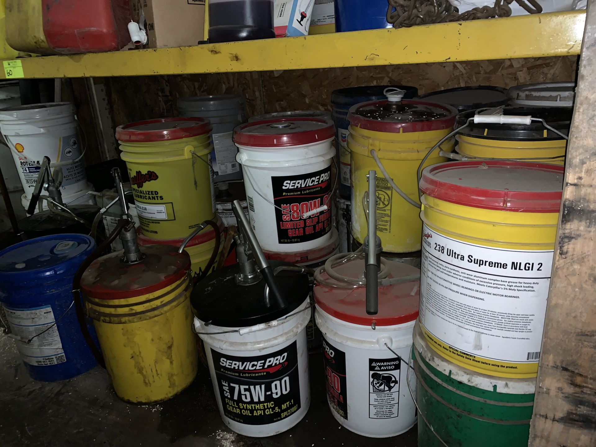 Contents of Racking - Gas cans, oil cans, chain, filters, pumps for 5 gal buckets. - Image 3 of 4