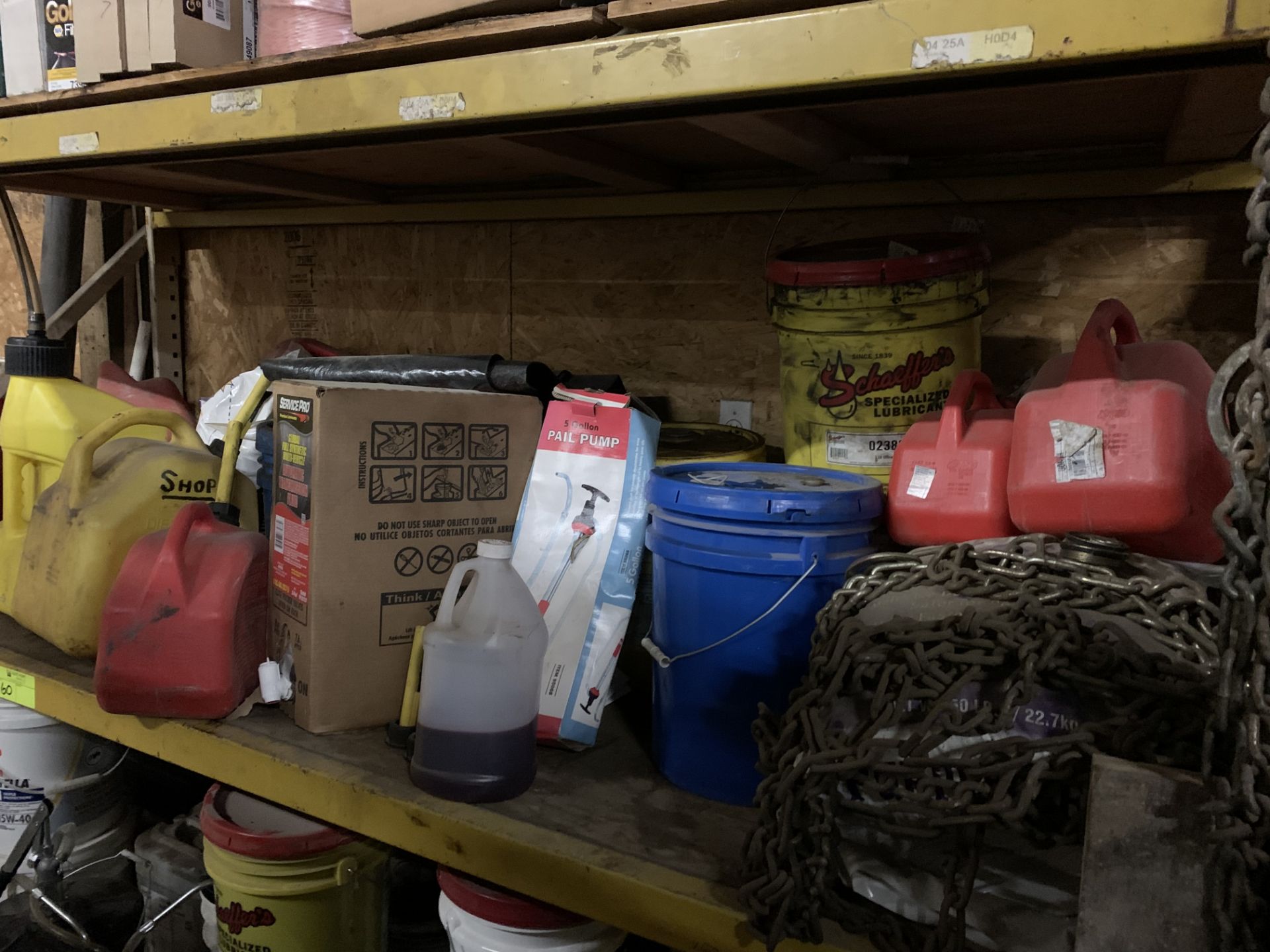 Contents of Racking - Gas cans, oil cans, chain, filters, pumps for 5 gal buckets. - Image 4 of 4