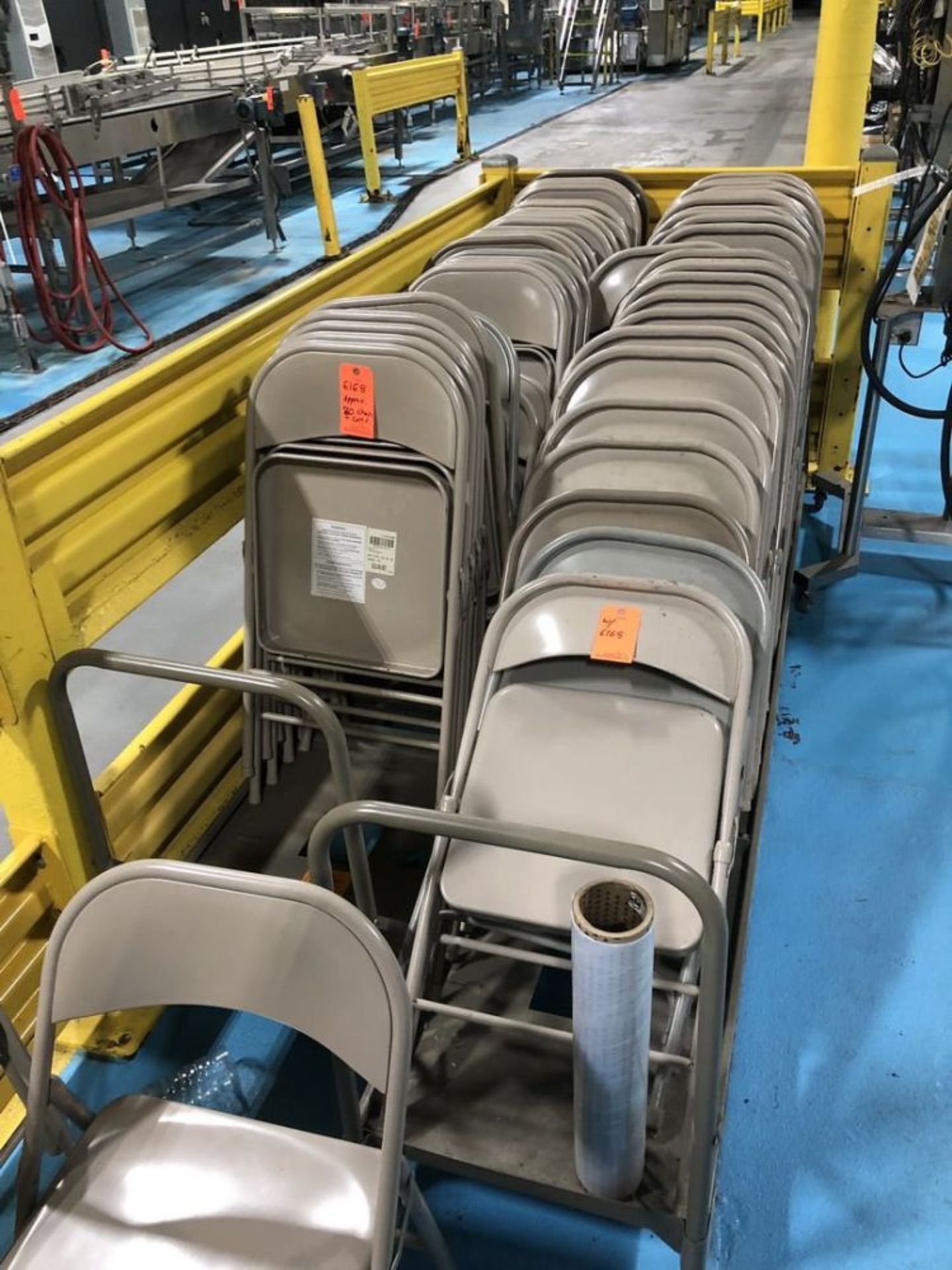 Approx. (90) Folding Metal Chairs with (2) Storage Carts. Location in Plant: Main Building