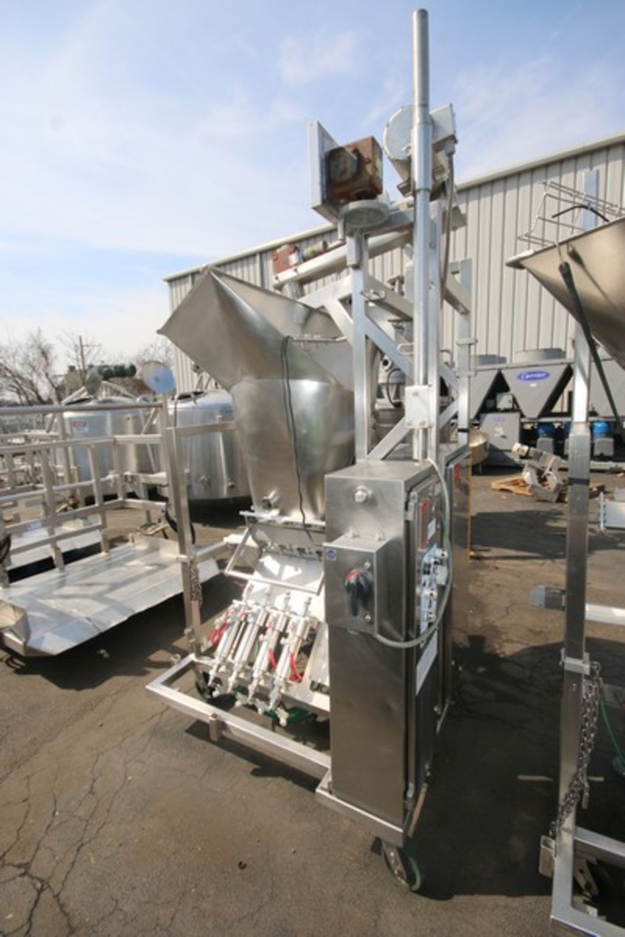 Raque S/S 4-Piston Filler,M/N PF2.5-4, S/N 1000164, with Hopper, 460 Volts, 3 Phase, Mounted on