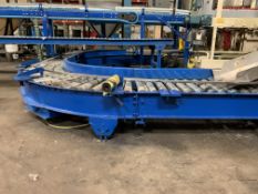 Powered U Shape Roller Conveyor to feed boxes from Box Erector to the Drop Case Packer (LOCATED IN