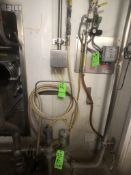 ECOLAB SANITIZING SYSTEMS AND HOSE REELS THROUGHOUT RAW MILK SILO ALCOVE, INCLUDES ECOLAB MODEL