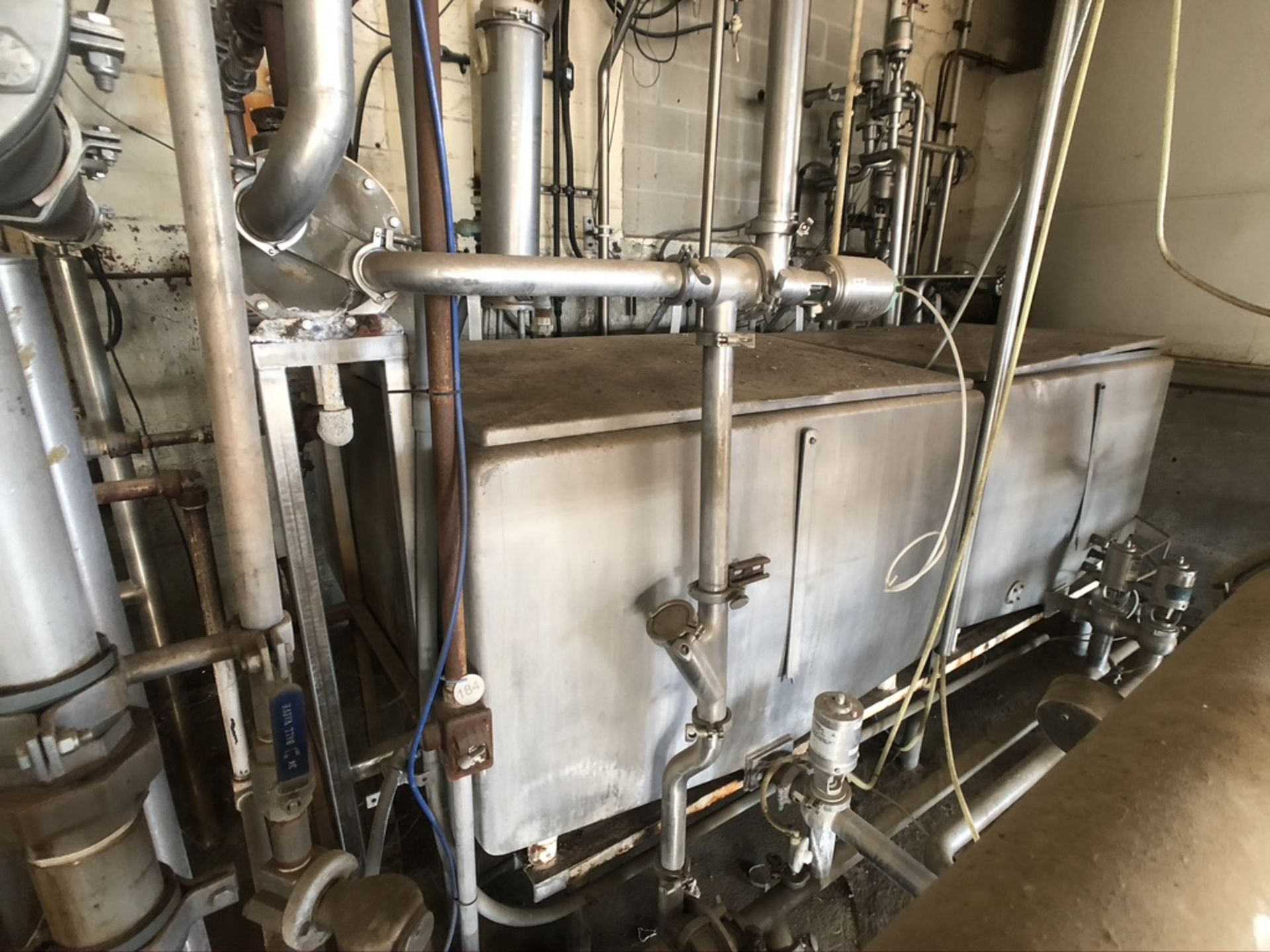 2-TANK SKID-MOUNTED CIP, INCLUDES SHELL AND TUBE HEAT EXCHANGER, INCLUDES (2) CENTRIFUGAL PUMPS, ABB