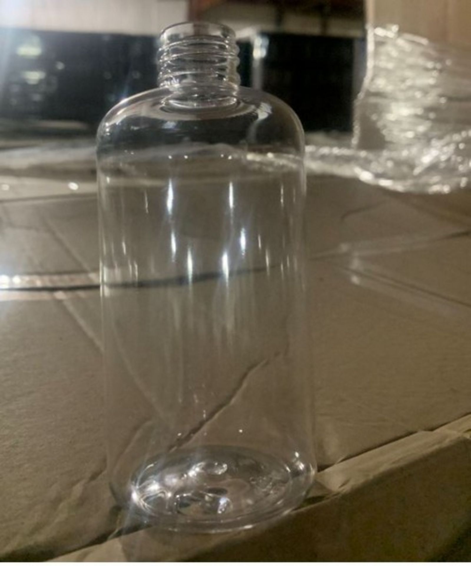 50,000 8-oz CLEAR Bottles with Pumps Bid per 1000 (LOCATED IN IOWA,