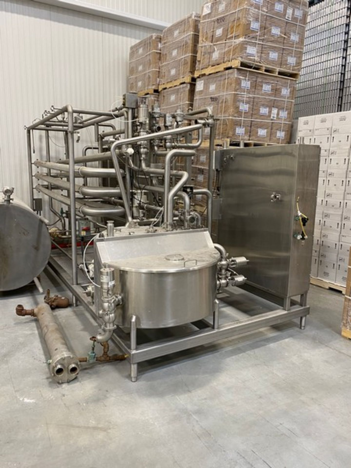 CFR 80,000 lbs. per hour HTST Skidded Pasteurizer with 4" Holding Tubes (Load Fee $1,000) (Located
