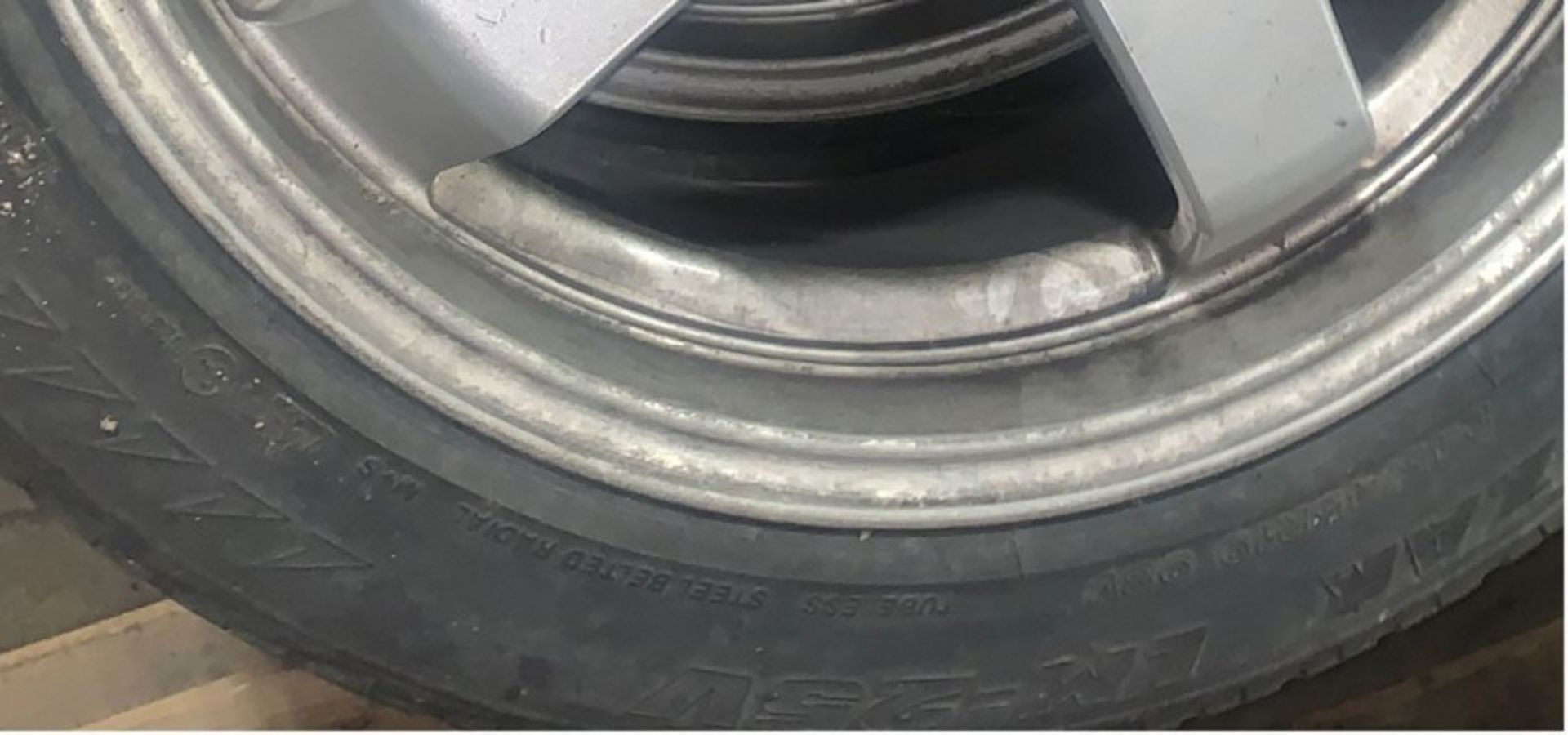 Set of four BLIZZAK tires on rim. Were used on a BMW 750Li (LOCATED IN IOWA, RIGGING INCLUDED WITH - Image 3 of 4