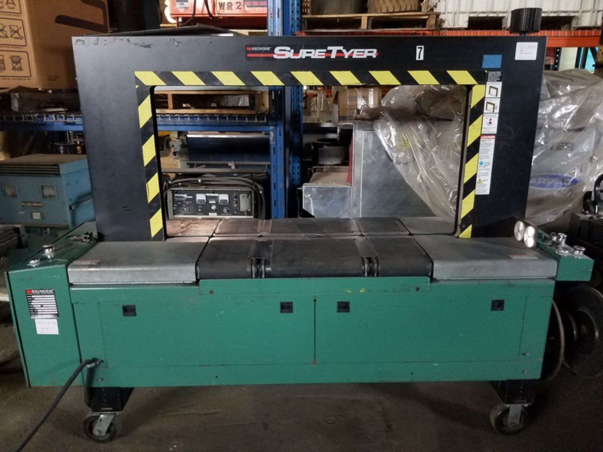 Signode suretyer arch strapping machine, S/N 132986, volt 240 (Located Fort Worth, TX)