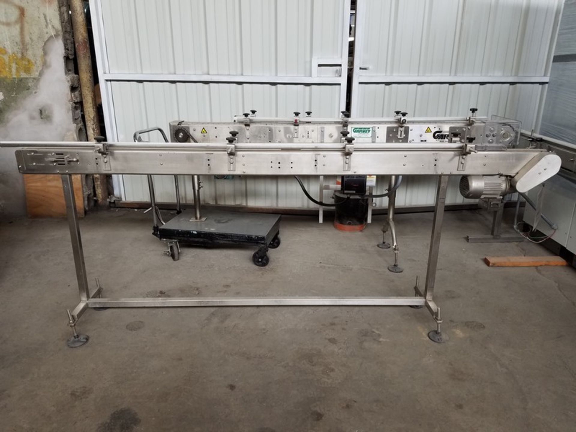 Aprox. 1 1/2" wide x 108" long x 40" high stainless steel food grade belt conveyor