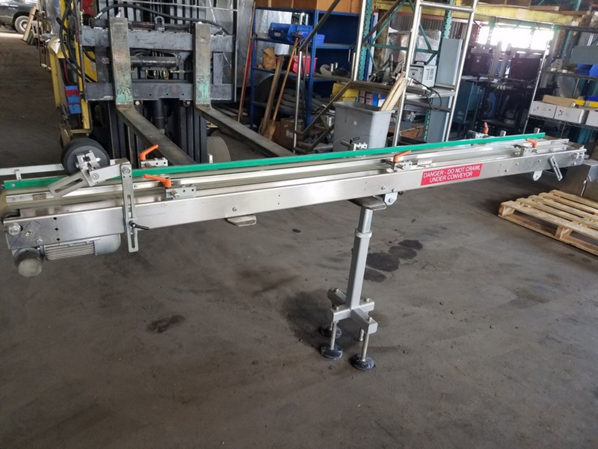Aprox. 6" wide x 96" long stainless steel belt conveyor (Handling, Loading & Site Management Fee: