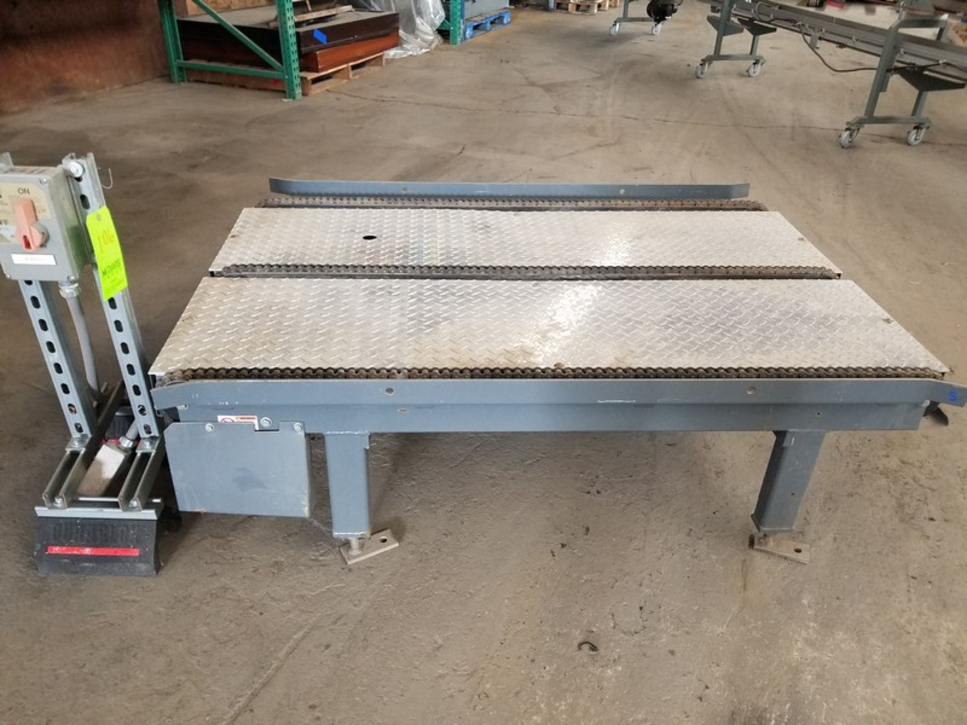 Aprox. 42" wide x 60" long x 18" height chain drive pallet conveyor (Handling, Loading & Site