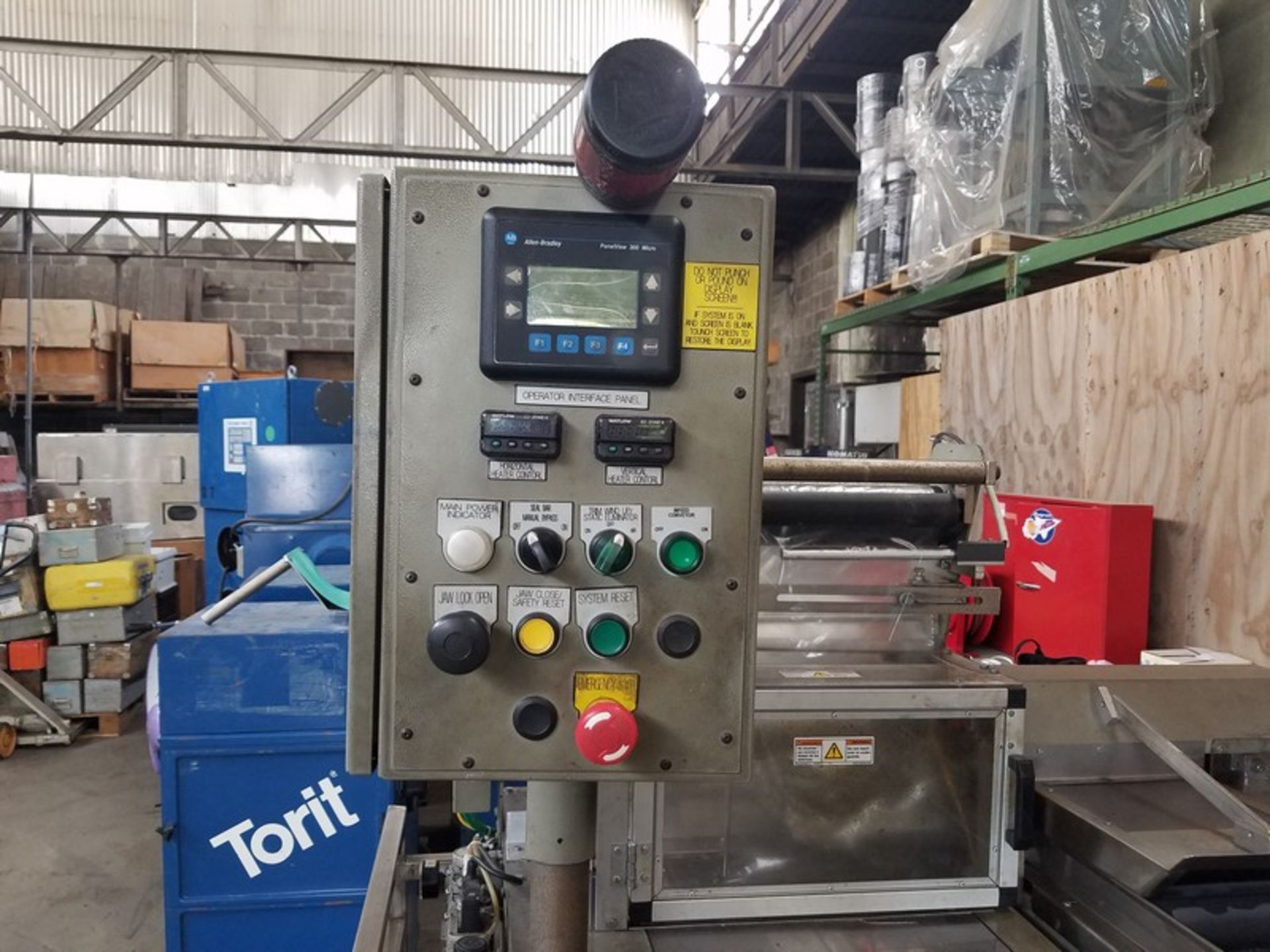 Rennco 201 Automatic drop bag sealer, serial # XRU21036333P7, volt 120, with conveyor