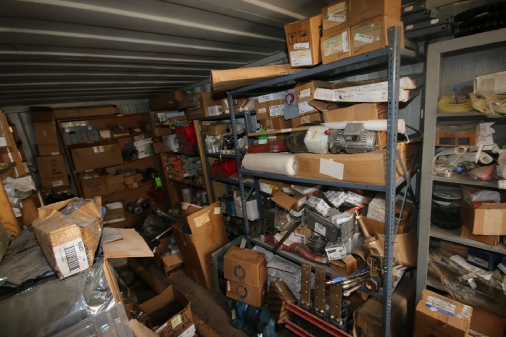 Assorted Spare Parts on 4-Shelving Units, Includes Sprockets, Gauges, Valves, Bearings, Motors,
