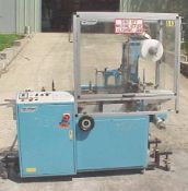 MULTI-PAK MODEL F40, SLEEVE WRAPPER/BUNDLER, SERIAL NUMBER F 40 8702. UNIT FEATURES SIDE