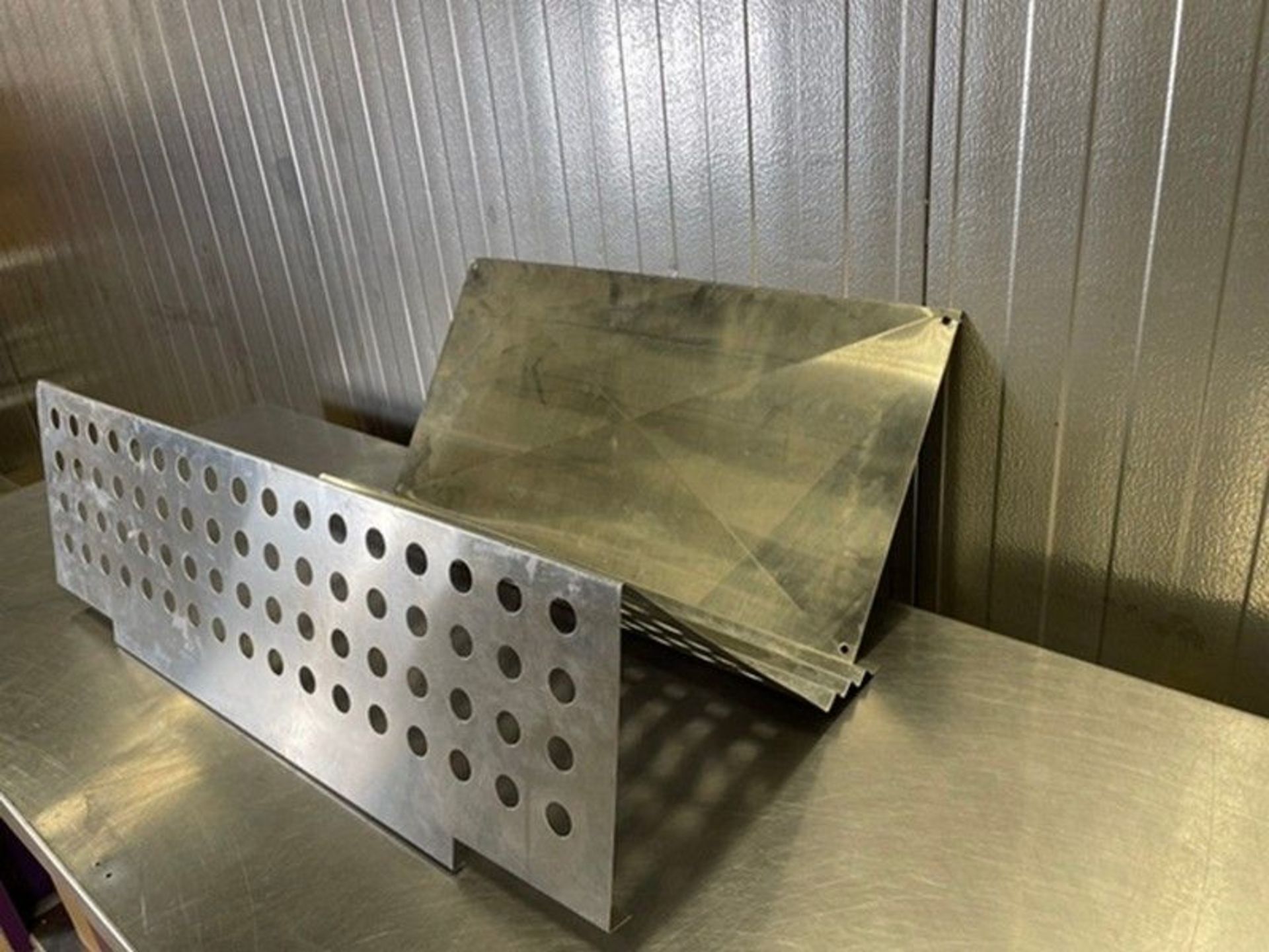 S/S Grating with Drain Holes (Auction ID 256742fd) (Handling, Loading, & Site Management Fee: $25.00