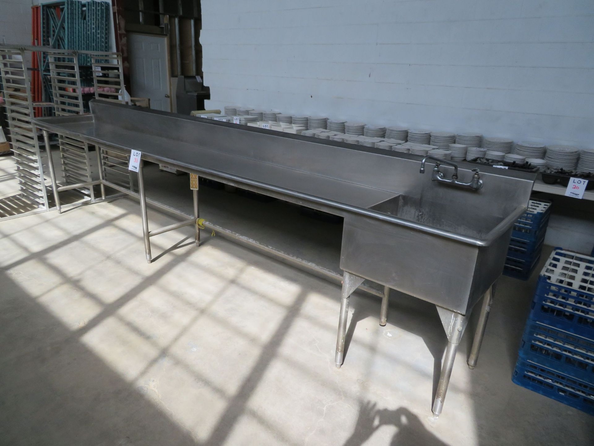 Stainless steel counter w/ sink approx. 166"w x 27"d x 38"h