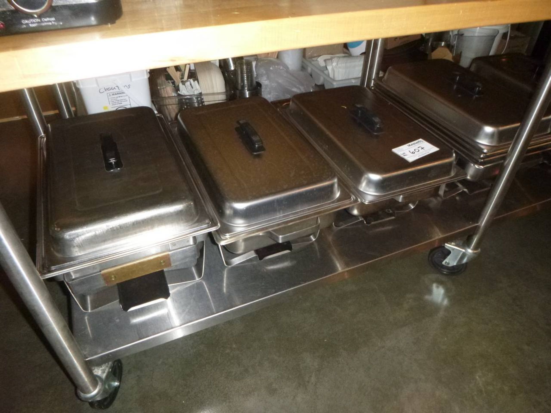 Lot warming trays under table