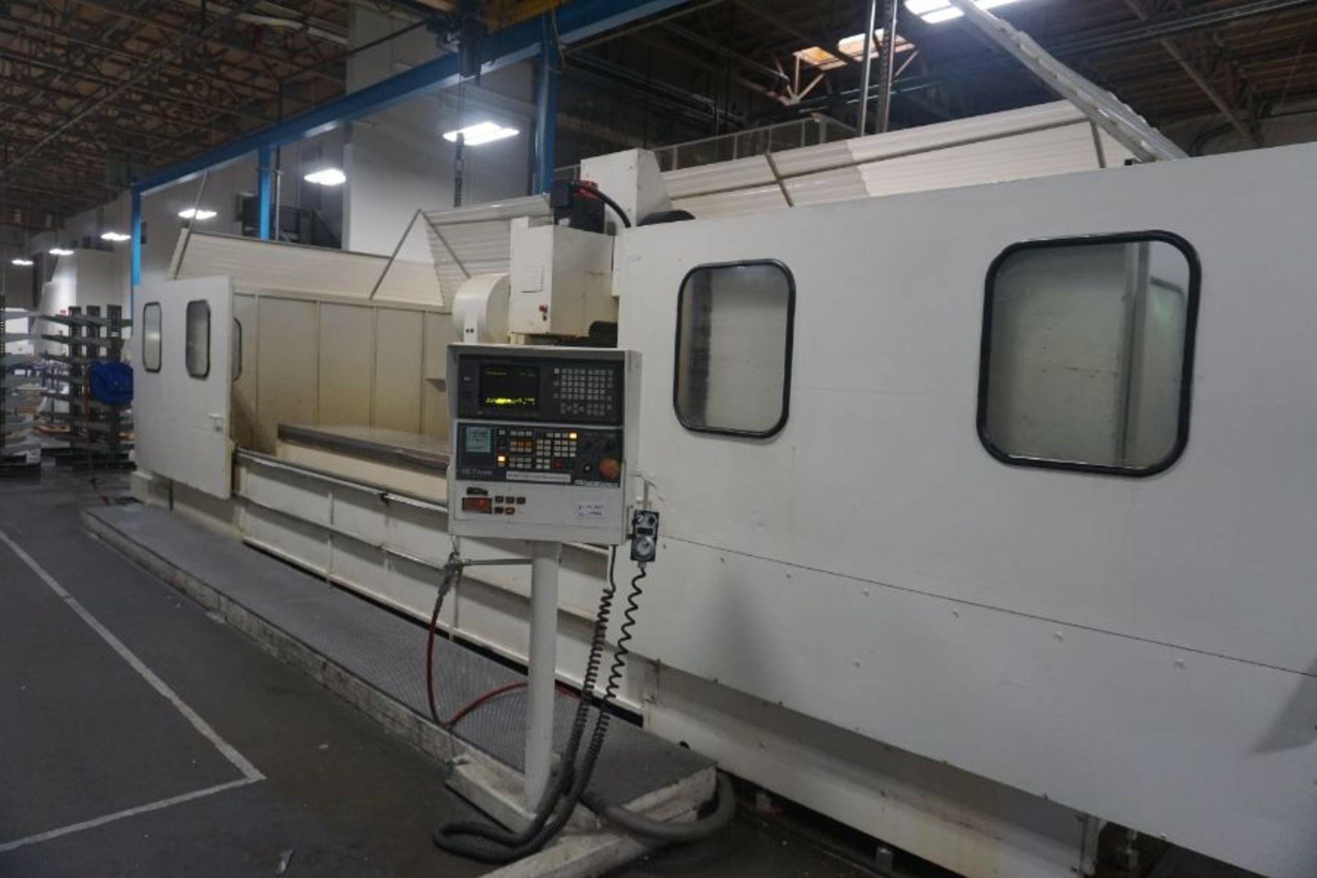 Komo VMC-180, Fanuc 16M, 180" x 24" x 22" travels, 10k RPM, CT40, 30 ATC, s/n 9996-03-01-97, New - Image 2 of 8