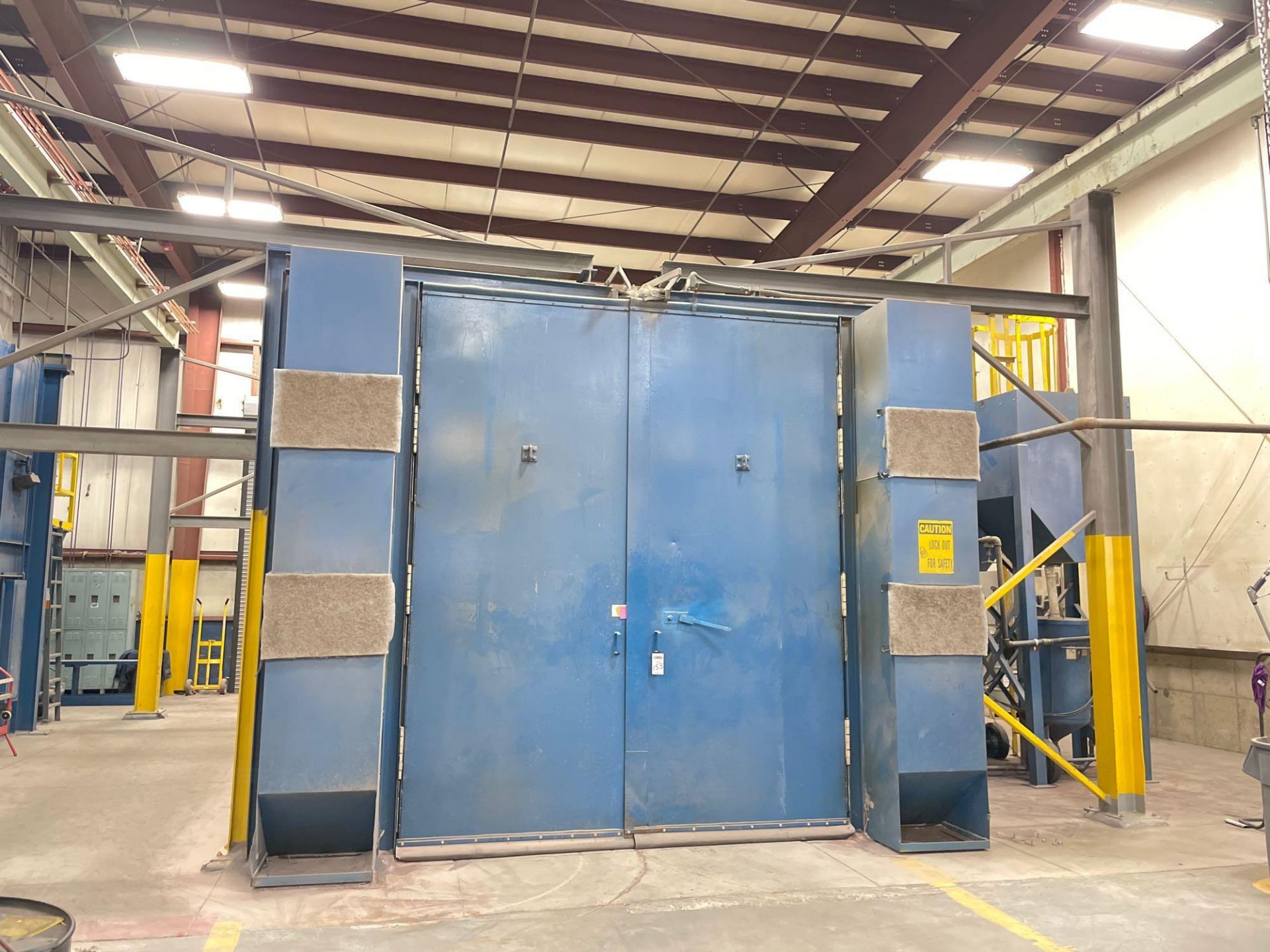 Hoffman Abrasive Blast booth, approx 18' x 12' x 12'h, perforated floor, media conveyor, elevator