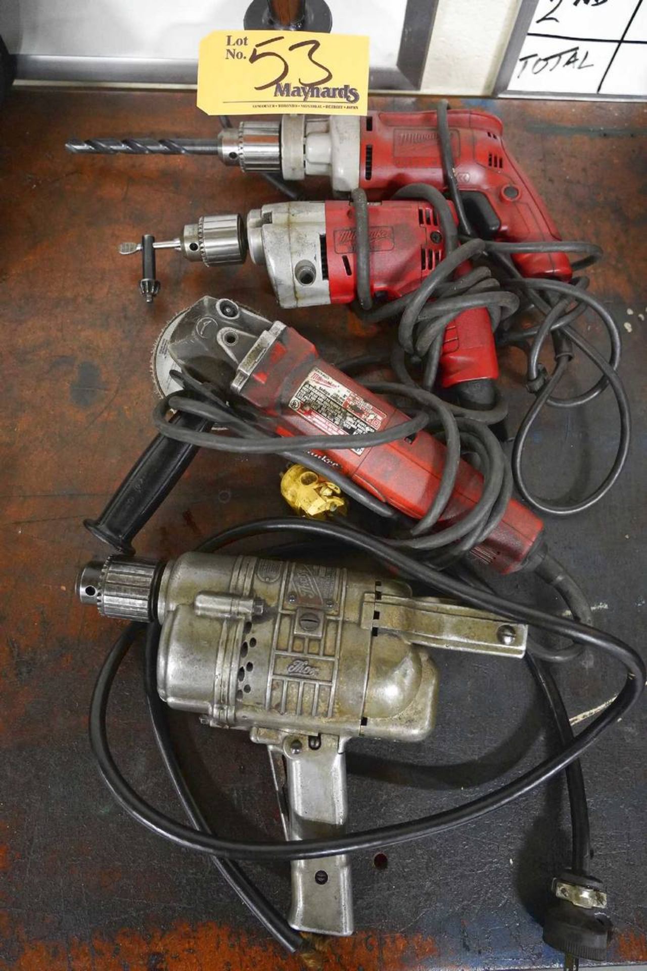 (3) Corded Drills And (1) Disk Grinder