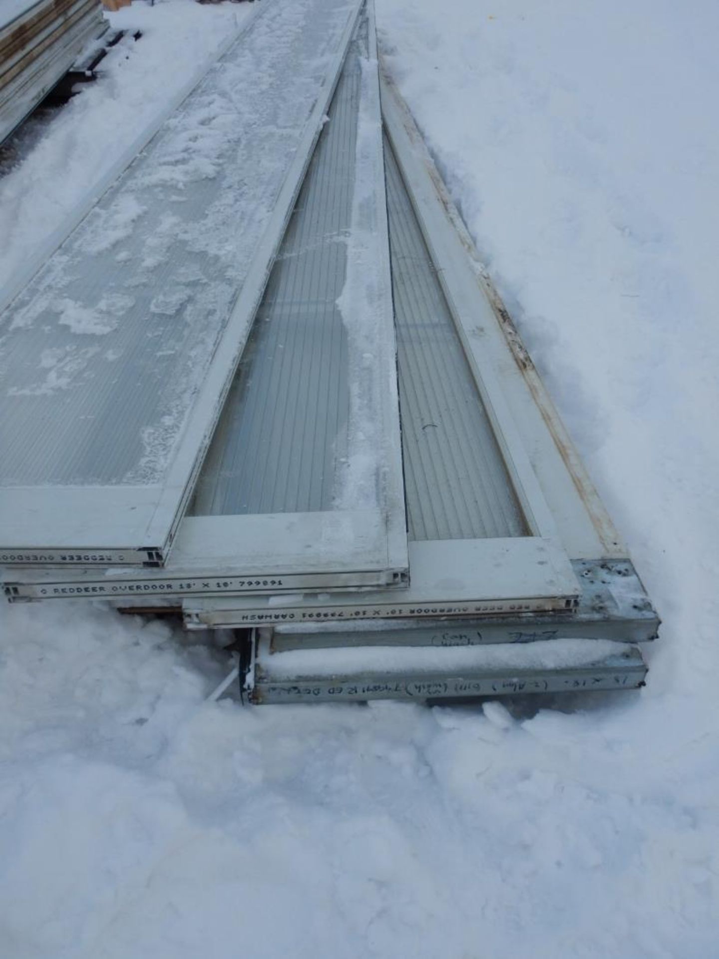 3 STEEL INSULATED OVERHEAD DOOR PANELS FOR 10'X18' DOOR W/ 2 POLYCARBONATE PANELS, NO HARDWARE