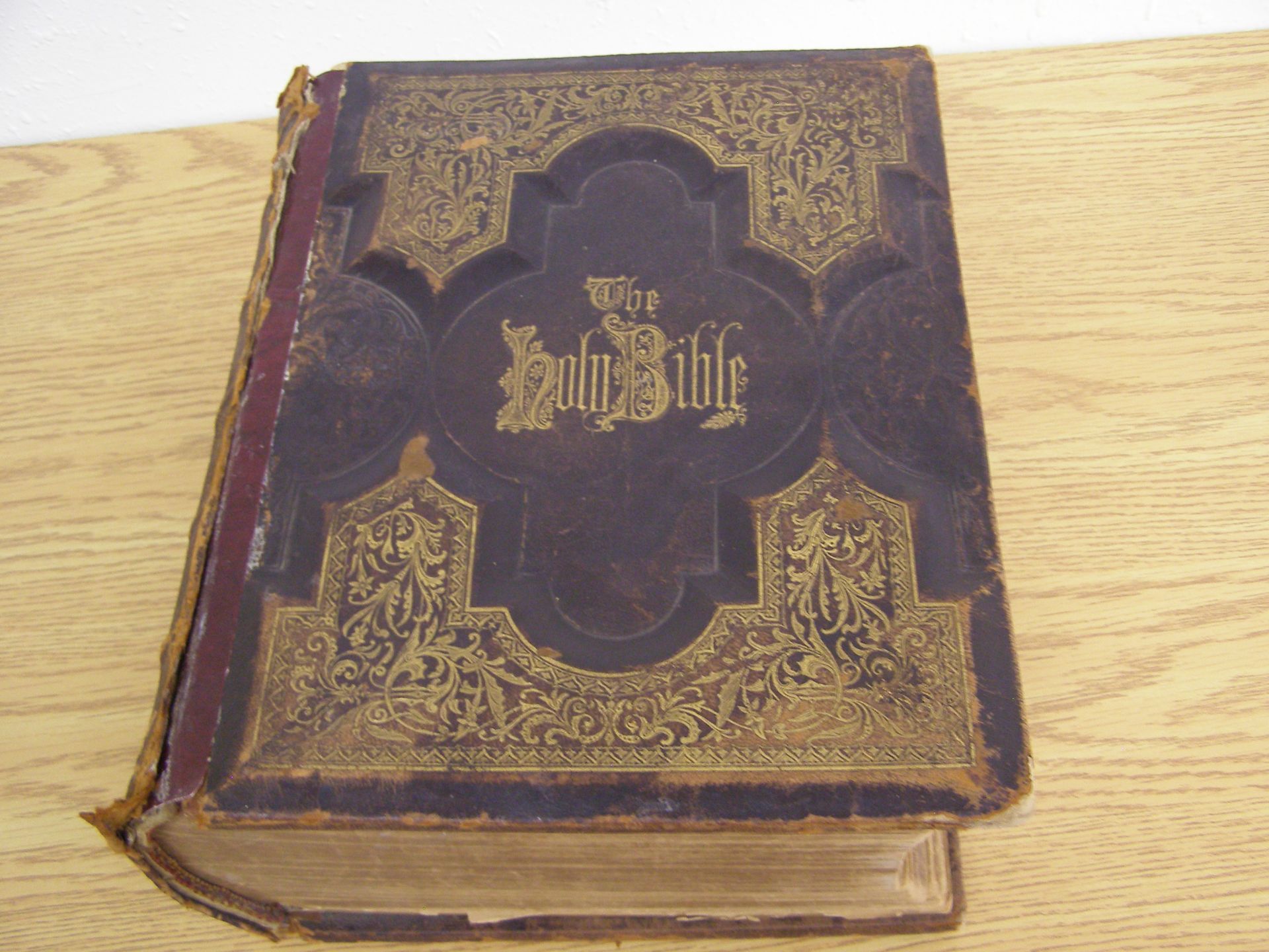 ANTIQUE LEATHER BOUND BIBLE Bible has an inscription inside dated October 31, 1899. Pictures in