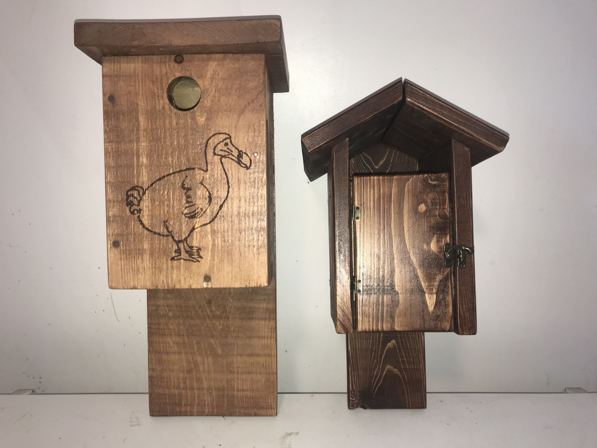 2 BIRDHOUSES Smaller birdhouse with door is a wren deterrent. Wrens can sometimes be territorial and