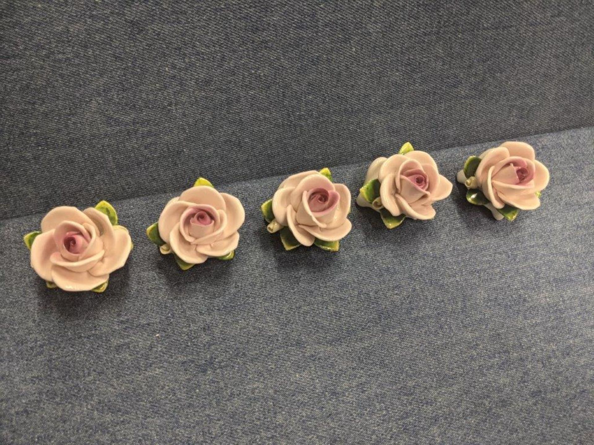 FIVE CHINA ROSES TO MARK PLACE SETTINGS