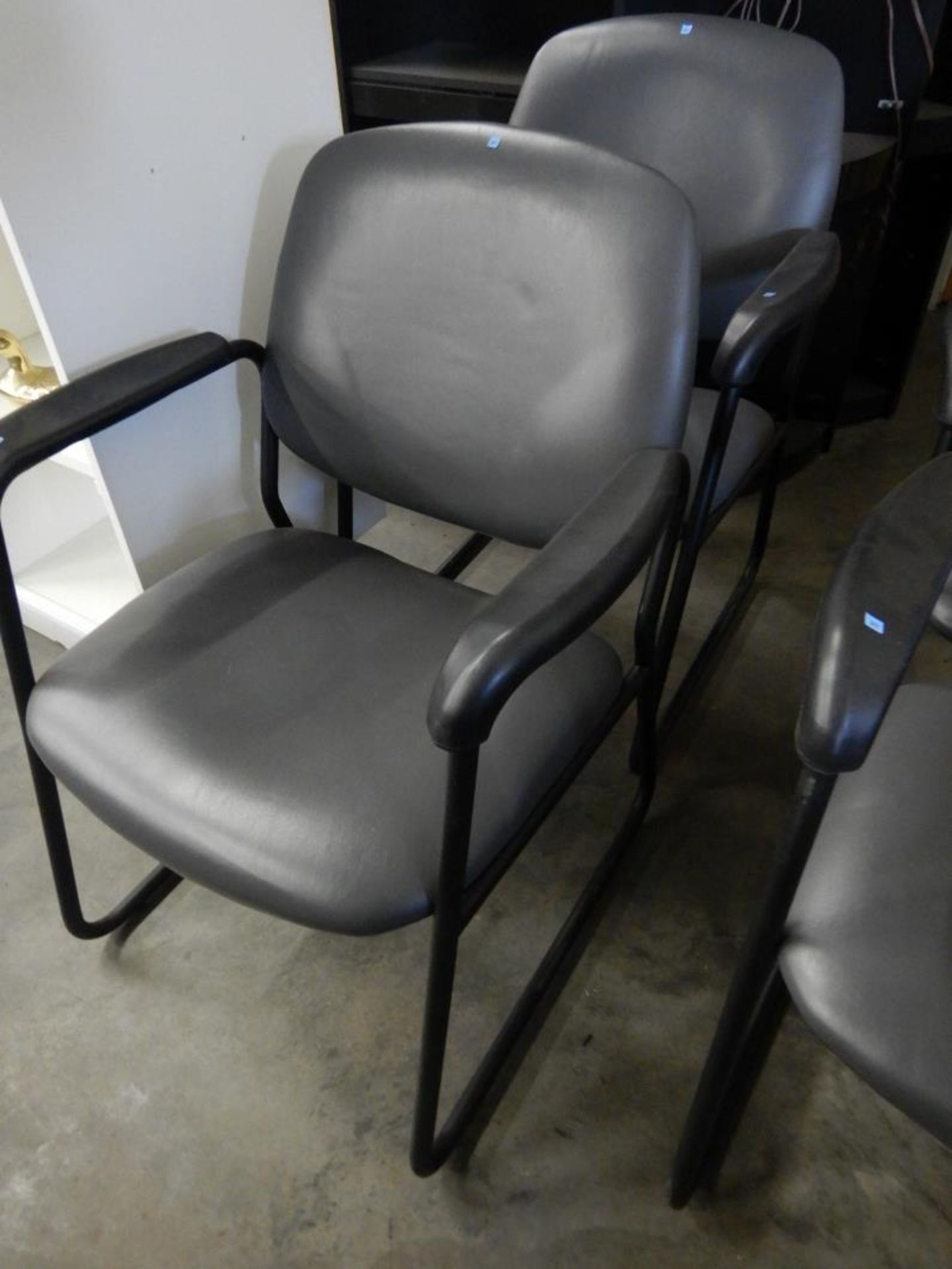 SKIDDED OFFICE SIDE CHAIR - DARK GREY PADDED WITH BLACK ARMS (PAIR)