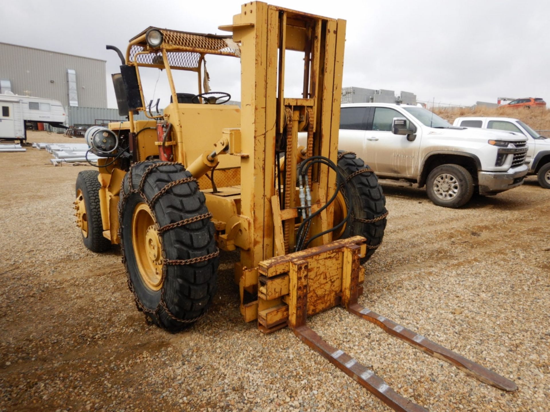 CARE EQUIPMENT 5000LB FORKLIFT S/N 379-T50-51, 13X24R & 9.00-20 RUBBER W/CANOPY, TIRE CHAINS, FORD - Image 3 of 10