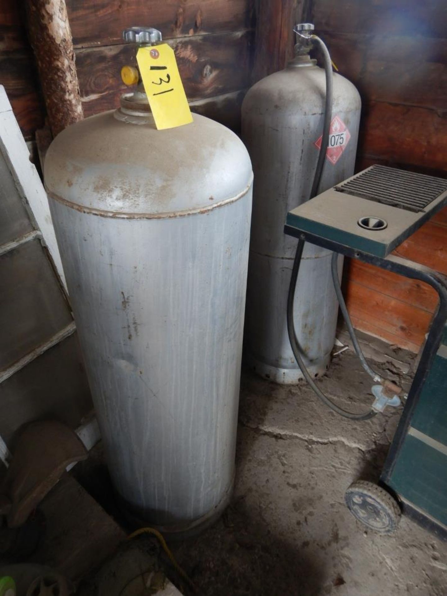 2-100LB LPG TANKS (1 FULL AND 1 EMPTY)