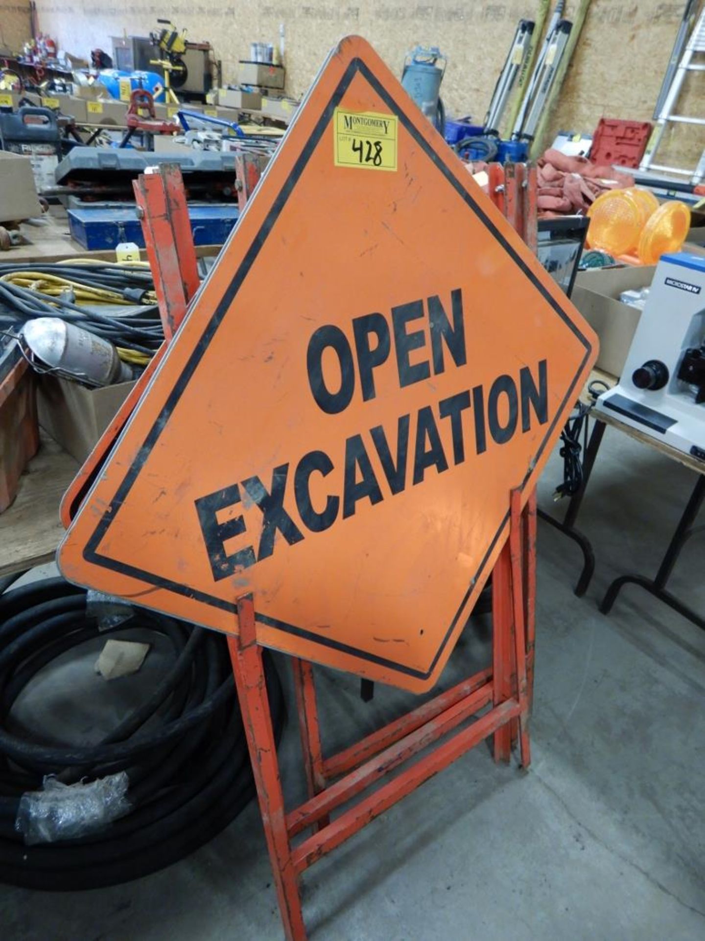 3-CONSTRUCTION SIGNS W/ FOLDING STANDS - 2-OH POWERLINE, 1- OPEN EXCAVATION