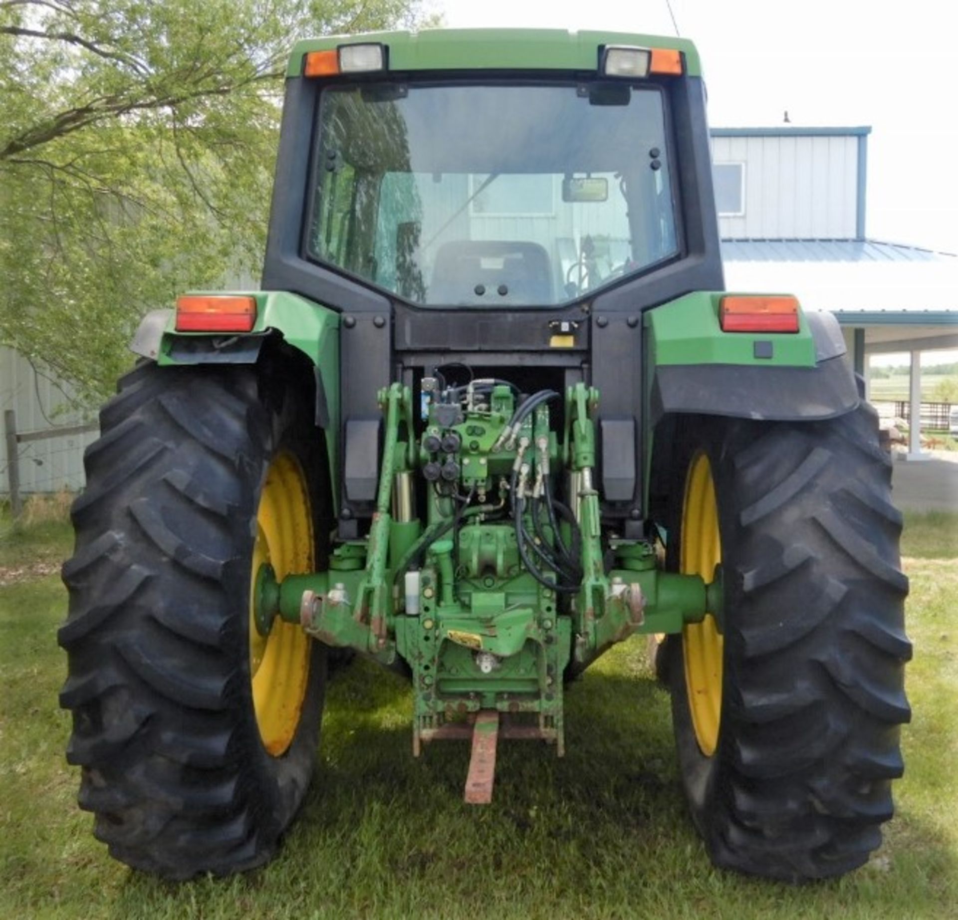 JOHN DEERE 6400 FWA TRACTOR W/FEL, GRAPPLE (GRAPPLE NOT ATTACHED - NO RAM) & 3PT HITCH, 7486 HOURS - Image 4 of 11