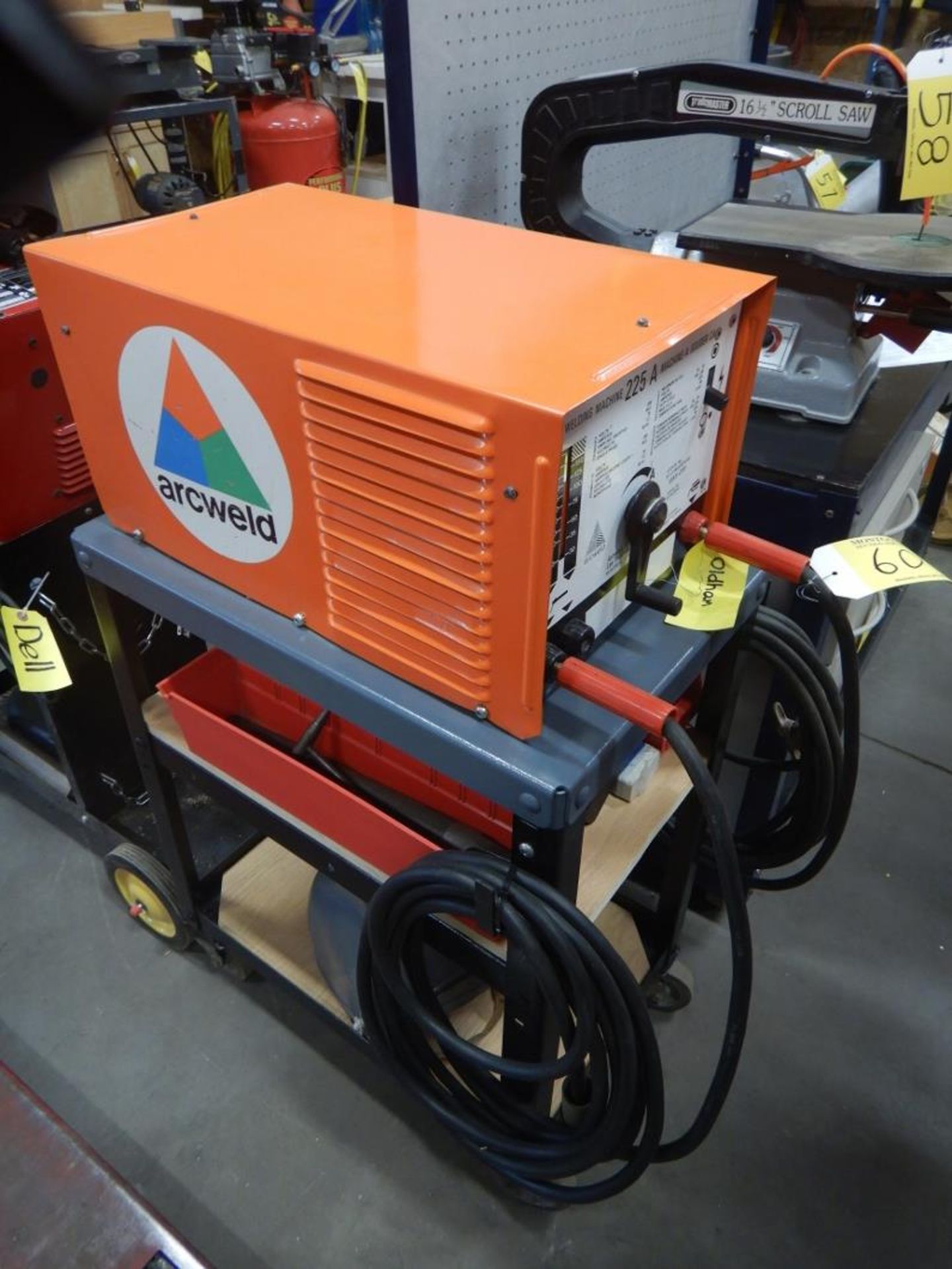 ARC WELD AC WELDING MACHINE W/ CABLES, ASSORTED ELECTRODES, MASK, CHIPPING AXE, ON WHEELED CART